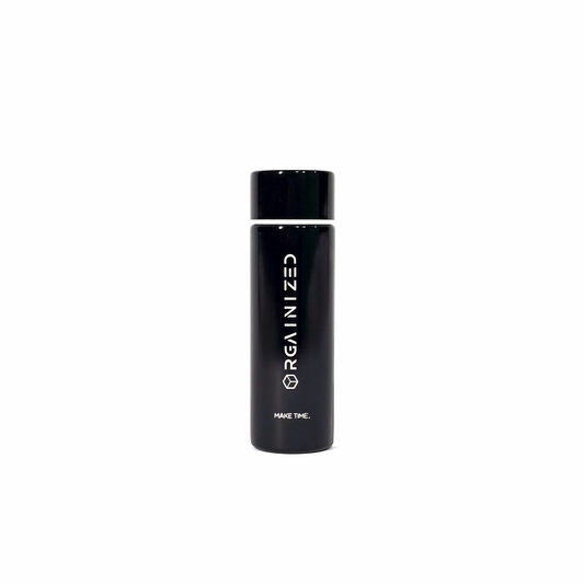 gloss_black_1 – front view. Black cylindrical container with 'Orgainized' branding photographed on a white background