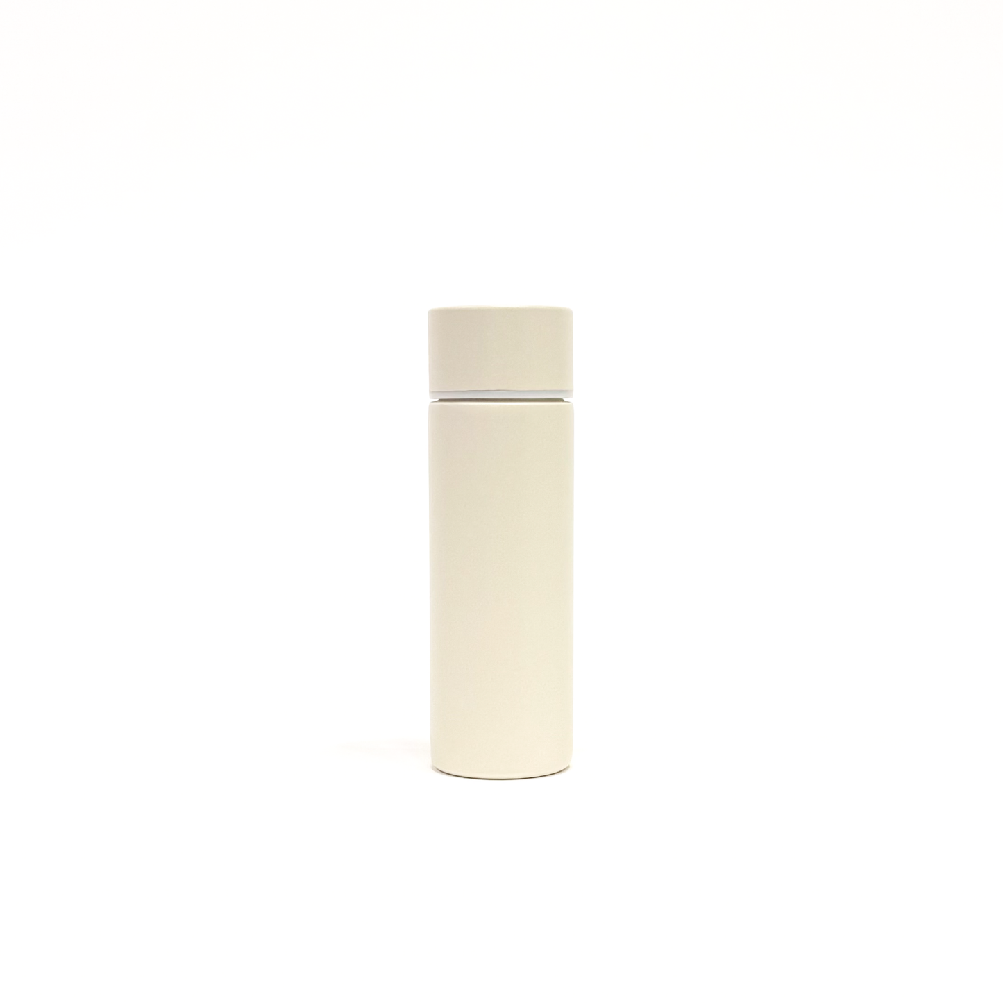 white_sand_4 – back view. Off-white cylindrical container photographed on a white background