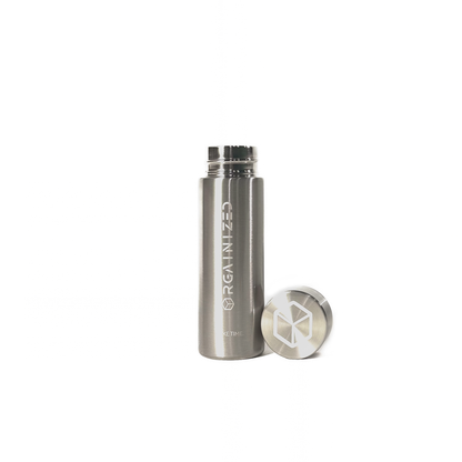 natural_steel_3 – uncapped view. Silver cylindrical container with 'Orgainized' branding photographed with the lid removed on a white background