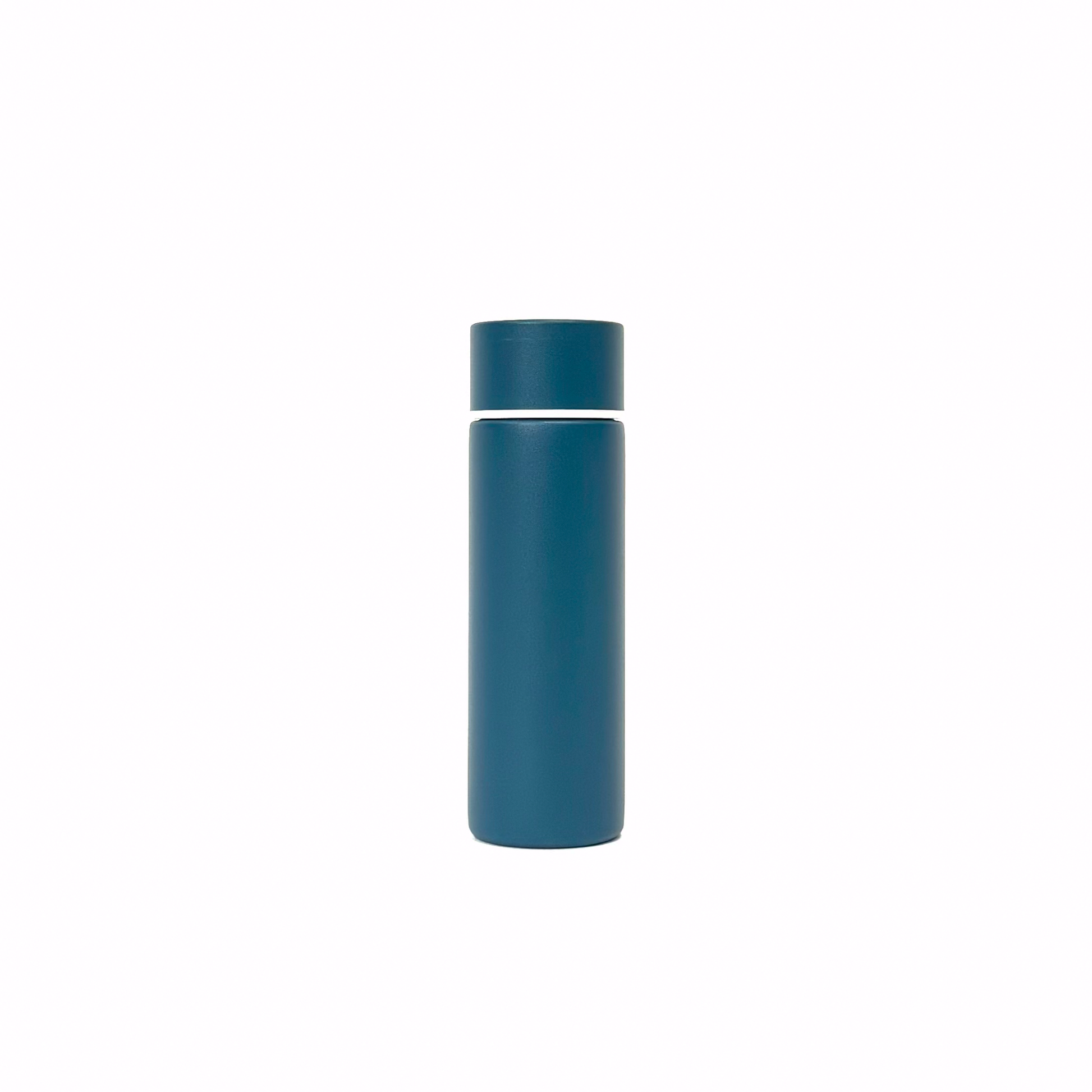 rogue_blue_4 – back view. Blue/teal cylindrical container photographed on a white background