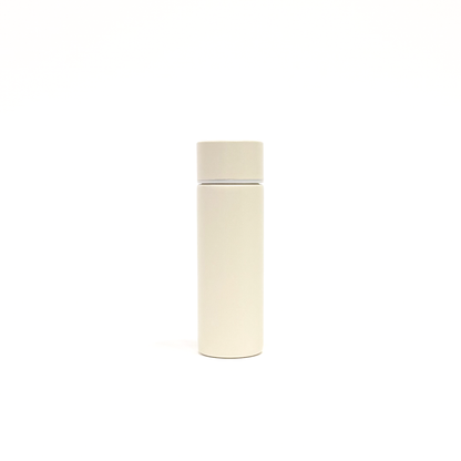 white_sand_4 – back view. Off-white cylindrical container photographed on a white background